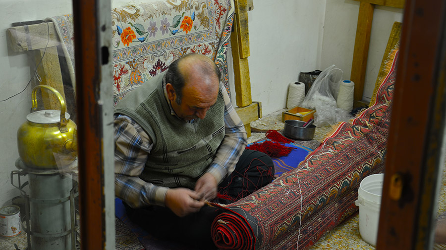 Carpet repairing shop in Isfahan bazaar