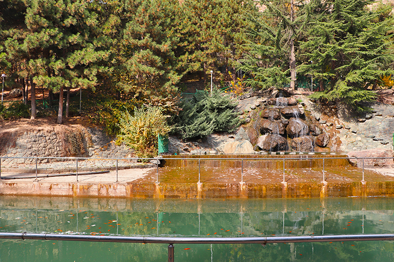 stone waterfall and fish pond of jamshidiyeh stone park